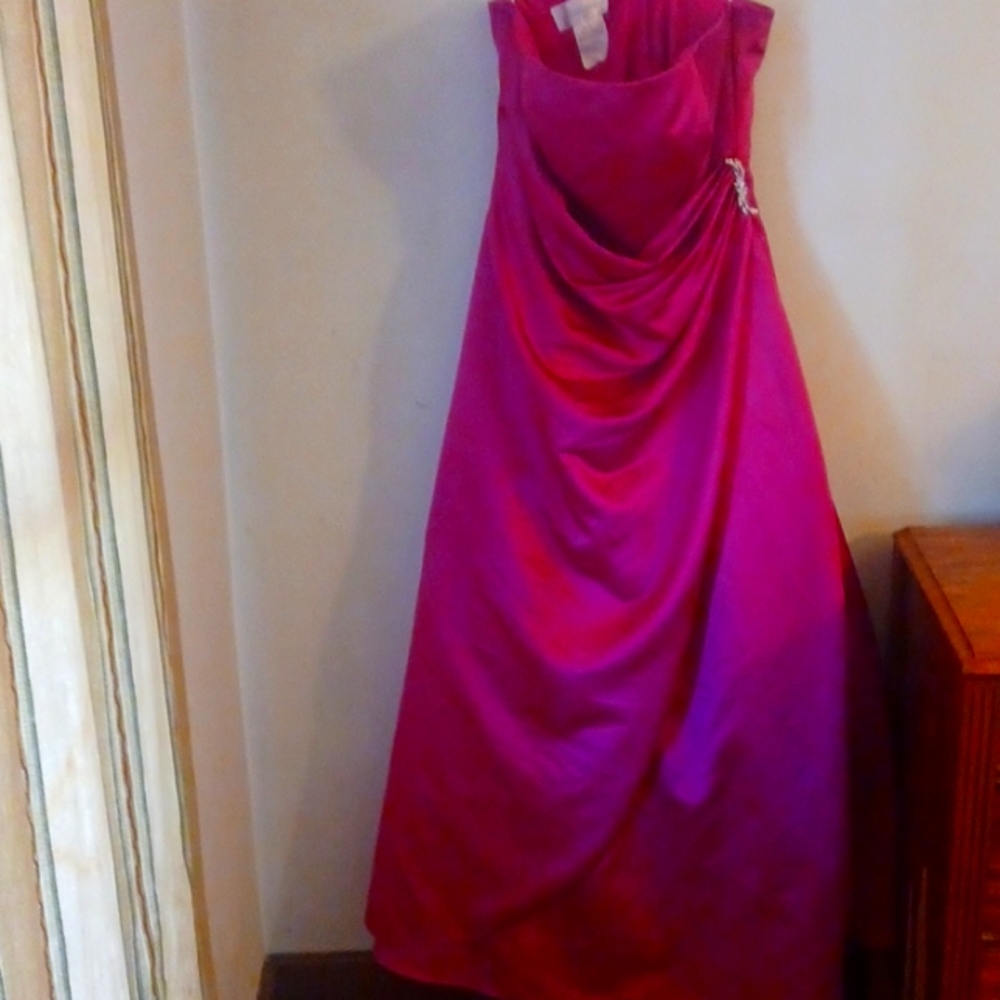 Used as a bridal dress once however would be awesome prom next year